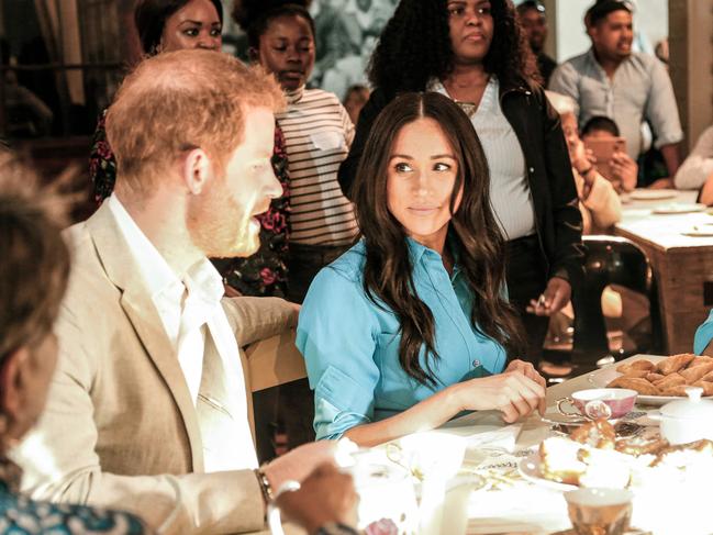 Harry and Meghan attend a dinner at the District Six Homecoming Centre in Cape Town. Picture: AFP