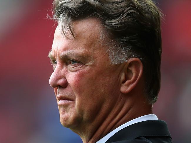 MANCHESTER, ENGLAND - AUGUST 16: Manchester United Manager Louis van Gaal looks on prior to the Barclays Premier League match between Manchester United and Swansea City at Old Trafford on August 16, 2014 in Manchester, England. (Photo by Alex Livesey/Getty Images)