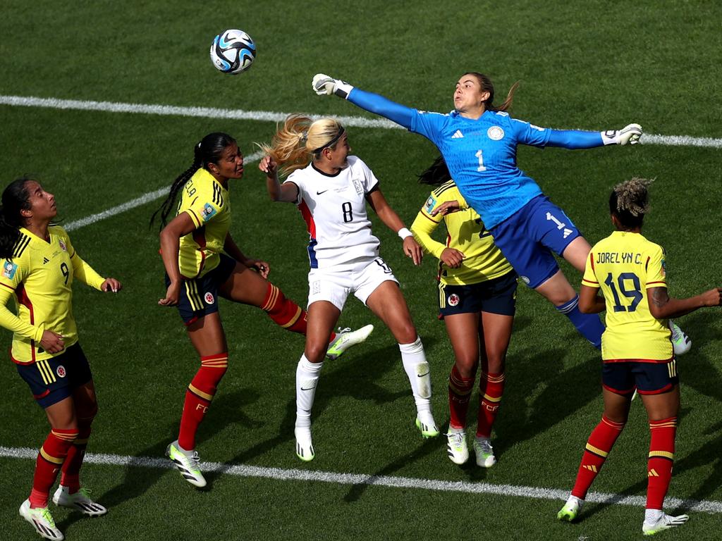 A giant leap from Catalina Perez of Colombia as she punches the ball away. Picture: James Chance/Getty Images