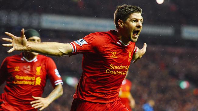 LIVERPOOL, ENGLAND - JANUARY 28: Steven Gerrard of Liverpool celebrates after scoring the opening goal during the Barclays Premier League match between Liverpool and Everton at Anfield on January 28, 2014 in Liverpool, England. (Photo by Laurence Griffiths/Getty Images)