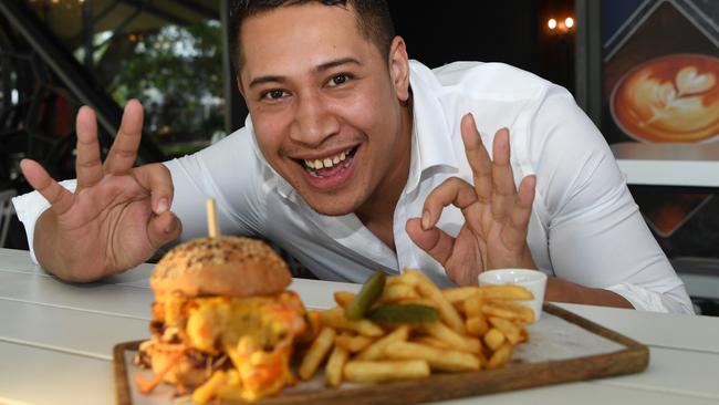 Sapphire Bar and Grill has won the People’s Choice award for the top burger. Lusiano Saia offers up the NT’s best. Picture: Katrina Bridgeford