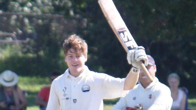 Butterworth celebrates his maiden first grade ton in March, 2011.