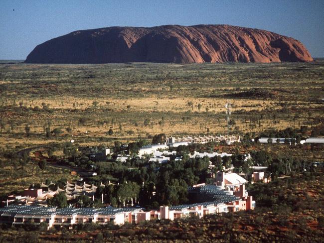 Aerial view of Sails in the Desert, part of Ayers Rock Resort at Yulara in Uluru national park with Ayers Rock in background. Pic NT Tourism Commision. Northern Territory (NT) / Hotel / National Parks Travel