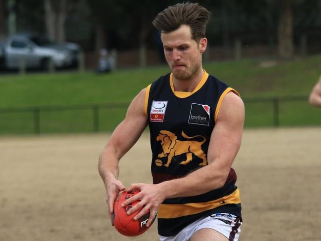 Jack Whiting gets a kick away for Doncaster East in the Eastern Football League (EFL). Picture: Davis Harrigan