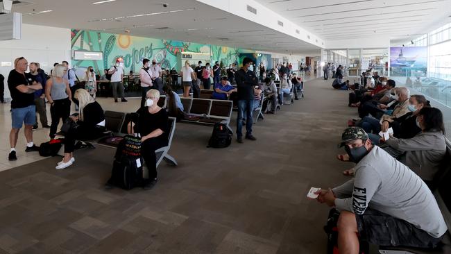 Passengers at Adelaide Airport wait for a Qantas flight to Canberra on November 18. Picture: Getty Images