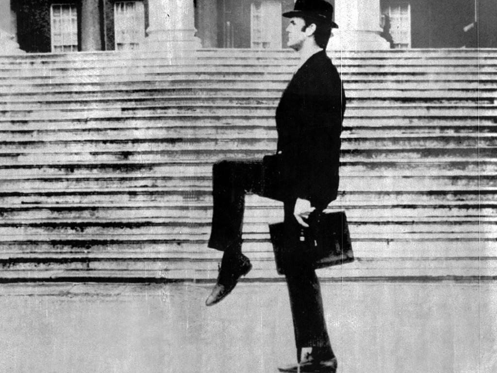 John Cleese in Monty Python skit, 'Ministry of Silly Walks'