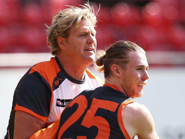 Former Hawks legend Dermott Brereton trains with Cam McCarthy during GWS Giants training at Spotless Stadium. The Giants with already 5 wins for the season face Adelaide at home this weekend. pic. Phil Hillyard