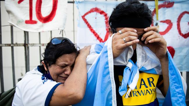 Fans cry for Diego Maradona in Buenos Aires after the news of his death Picture: Getty Images
