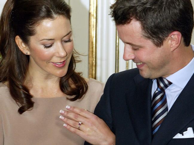 The pair show their engagement ring to the media at Fredensborg Castle on October 8, 2003. Picture: Scott Barbour/Getty Images