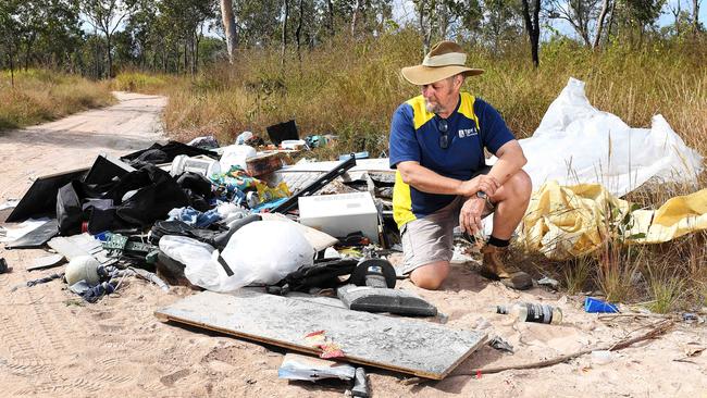 Pictured on state land, David Dudley, TIDY UP Townsville Coordinator, has had enough of the illegal dumping around Townsville. Picture: Shae Beplate.