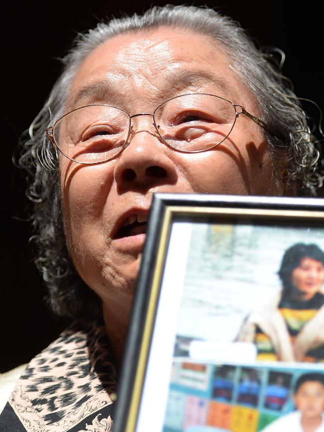 Grandmother Yang Fei Lin mourns her slain family out court. Picture: Jeremy Piper