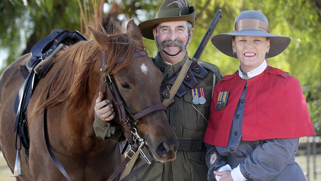 Bill & Sharon Gunter with 'George' at their Callington farm, dressed as an Australian Amy Nurse and Light Horseman from World War One. The couple will take part in the Anzac Day parade. picture: Bianca De Marchi