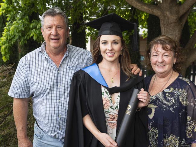 Bachelor of Nursing graduate Grace Banhidi with parents George and Melanie Banhidi at a UniSQ graduation ceremony at The Empire, Tuesday, October 29, 2024. Picture: Kevin Farmer