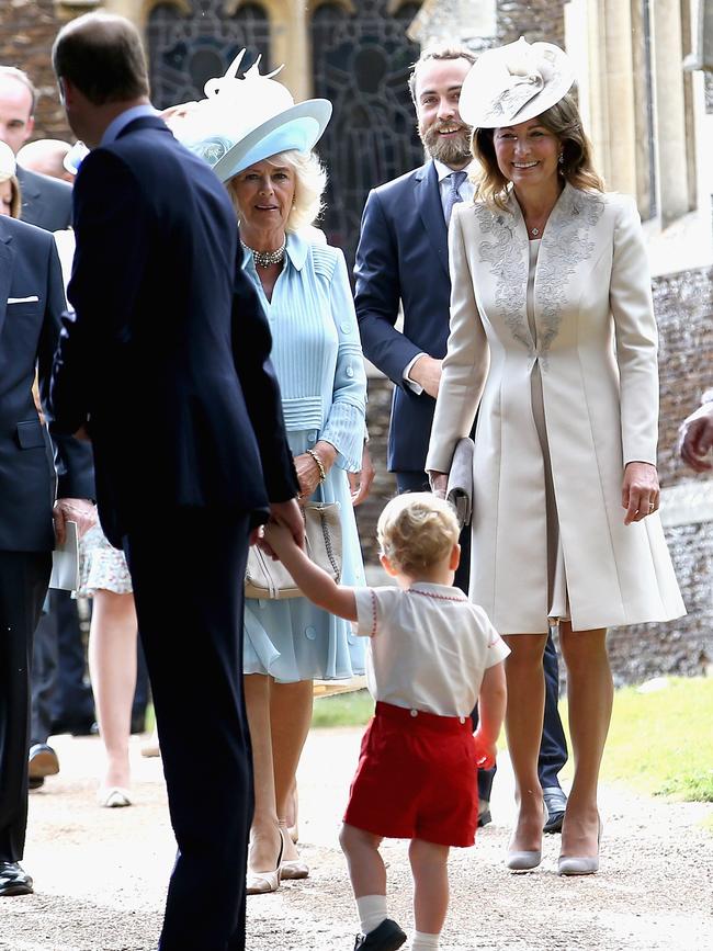 Prince George of Cambridge, Michael Middleton, Camilla, Duchess of Cornwall, James Middleton and Carole Middleton leave the Church of St Mary Magdalene on the Sandringham Estate for the Christening of Princess Charlotte of Cambridge on July 5, 2015 in King’s Lynn, England. Picture: Getty