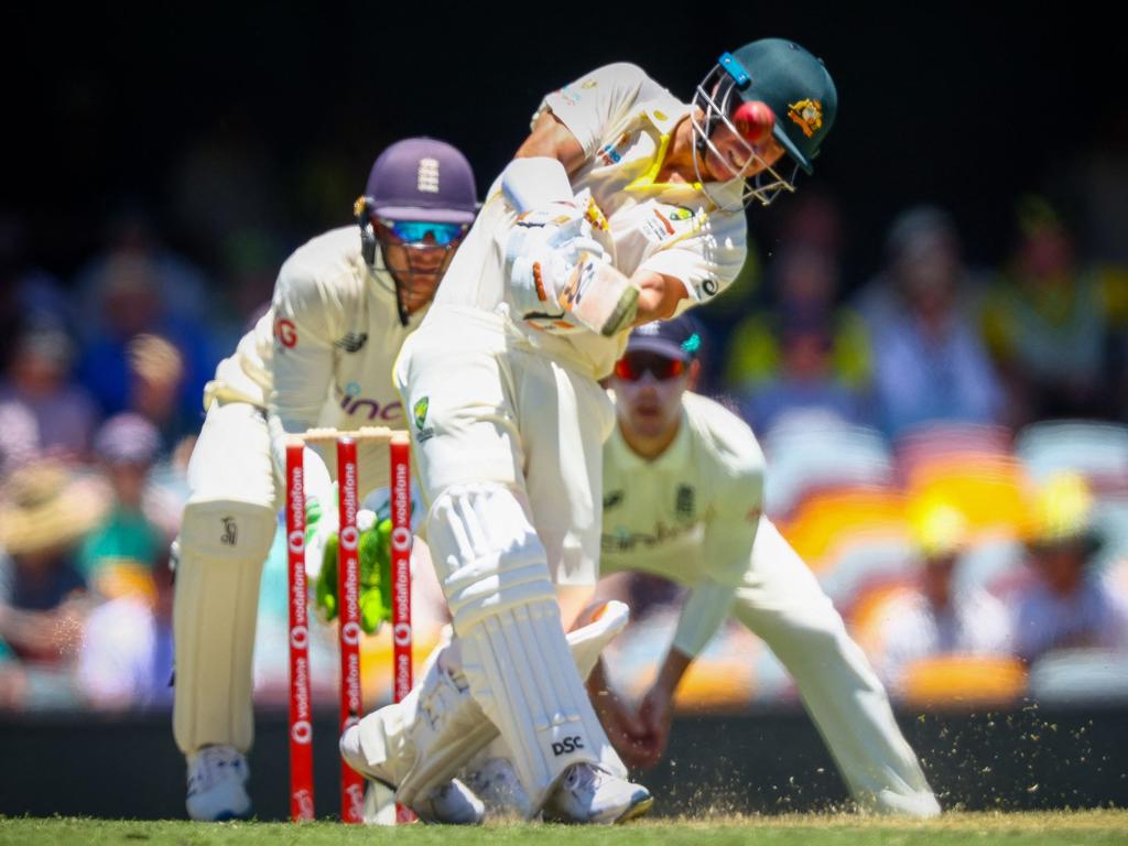 David Warner feasted on Jack Leach at the Gabba. Picture: Patrick Hamilton/AFP