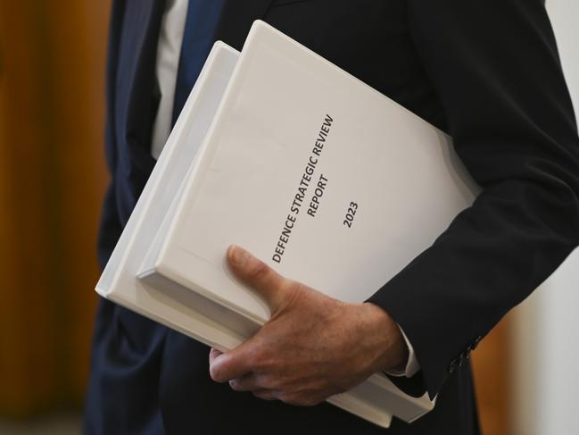 CANBERRA, AUSTRALIA - FEBRUARY 14: Sir Angus Houston delivers the Defence Strategic Review 2023 to Prime Minister Anthony Albanese and Deputy PM and Minister of Defence Richard Marles at Parliament House on February 14, 2023 in Canberra, Australia.  (Photo by Martin Ollman/Getty Images)