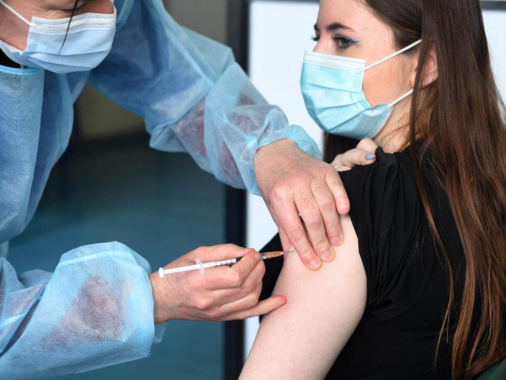 A nurse vaccines a health student with the Astra-Zeneca vaccine on March 12. Picture: Fred Tanneau/AFP