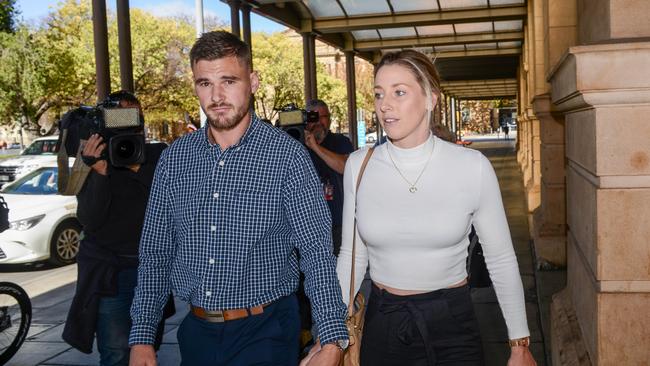 Nurse and AFLW player Deni Varnhagen leaves the District Court with her partner Jarrad Duthie, May 2022. Picture: Brenton Edwards