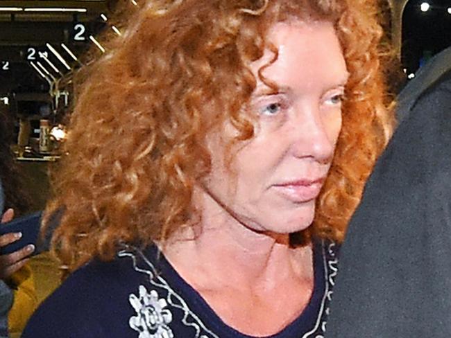 Arrested ... Tonya Couch is taken by authorities to a waiting car after arriving at Los Angeles International Airport. Picture: AP