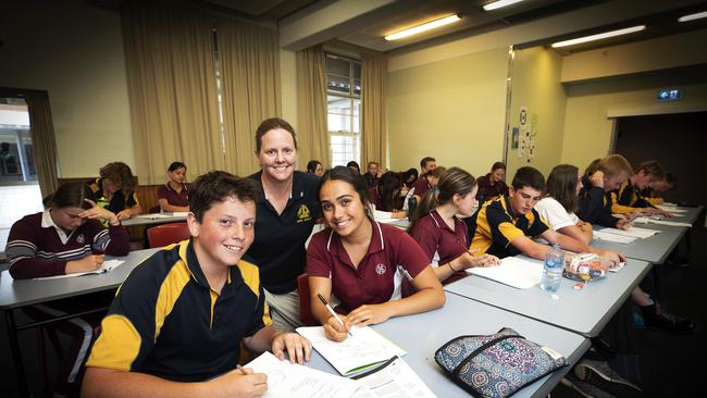 New Town High School teacher Jane Brooks during a Sport Science class with grade 10 students Jack Grace 15 (New Town High) and Temo Robertson 15 (Ogilvie High School). Picture Chris Kidd