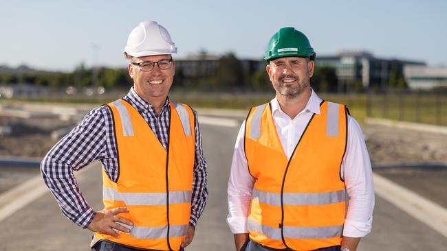 Rino Recyling's Daniel Blaser (left) and Todd Pepper inspecting roadwork using recycled material at Northshore, Hamilton