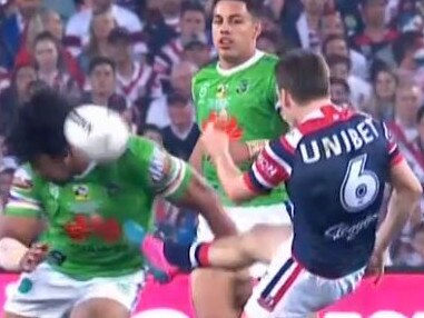 Sia Soliola charges down a kick by Luke Keary.