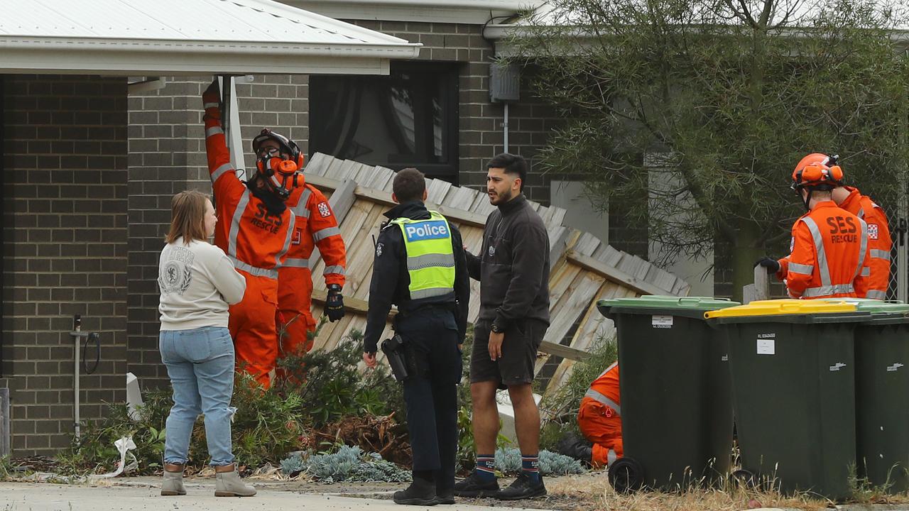 Woman arrested after car takes out fence