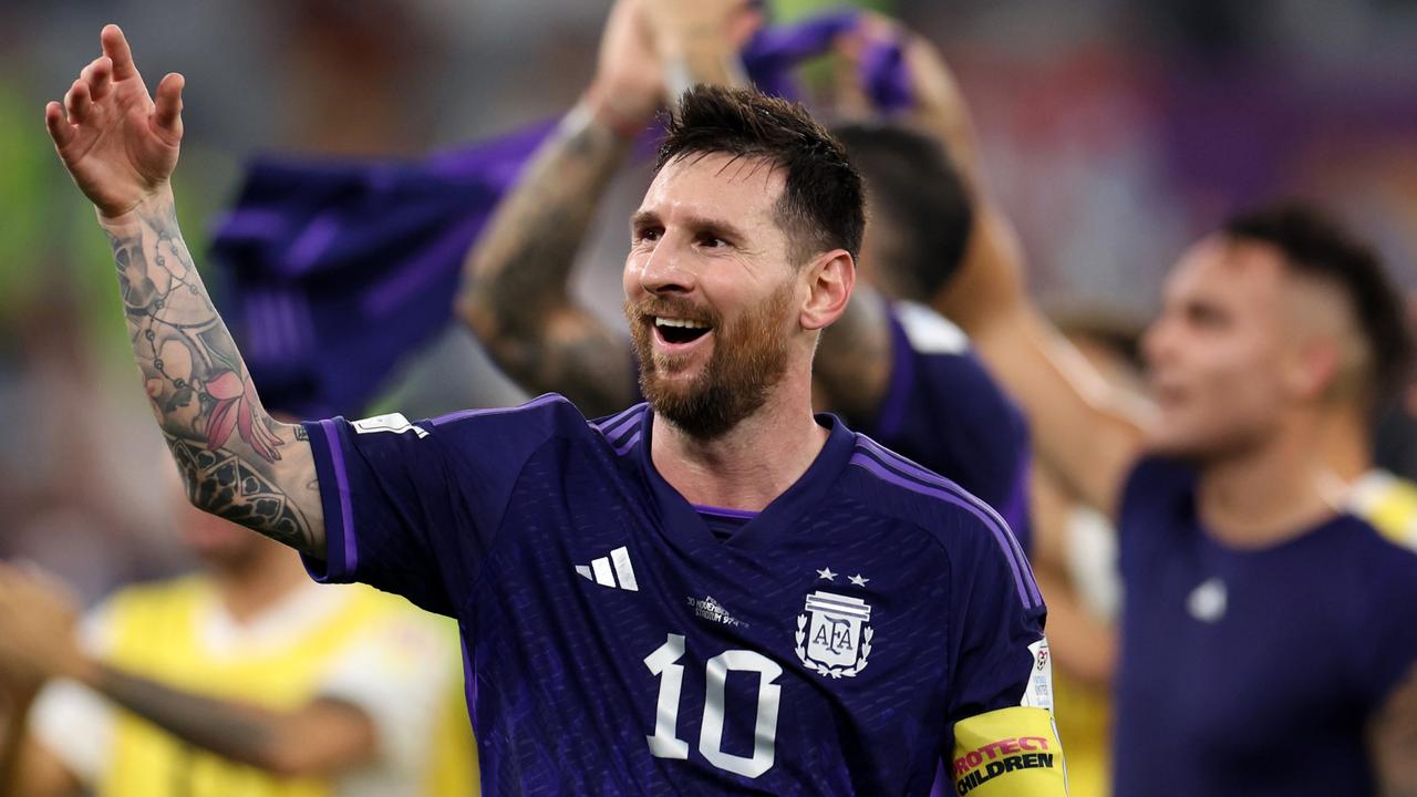 Lionel Messi celebrates before the clash with the Socceroos.