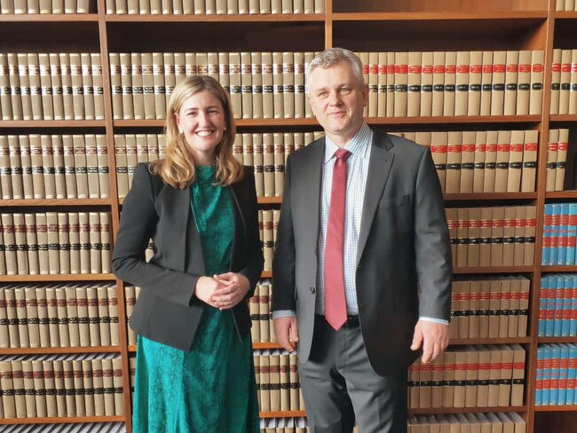 Magistrate Eoin Mac Giolla Ri pictured with the-then attorney-general, Shannon Fentiman,