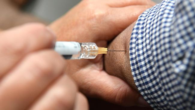 A man gets a flu vaccination. Picture: Sam Mooy/AAP