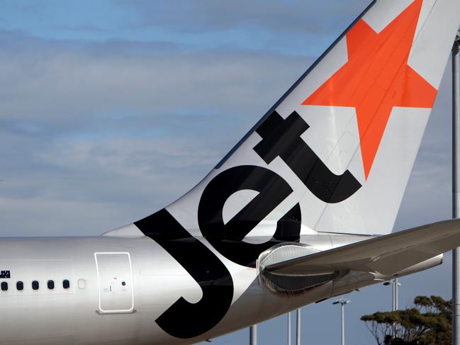 Generic Jetstar aircraft at Sydney airport. Jet star, plane.