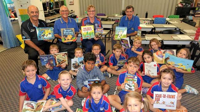 As part of Rotary's Literacy Month, the Rockhampton North Club presented books to Year 1 pupils at Crescent Lagoon State School recently.  ( L to R) President Ashley Pierpoint, Henry Boswood, Teacher Julie Thurecht and Alan Alt were pleased to see the happy faces of pupils with their new books. Picture: Contributed.