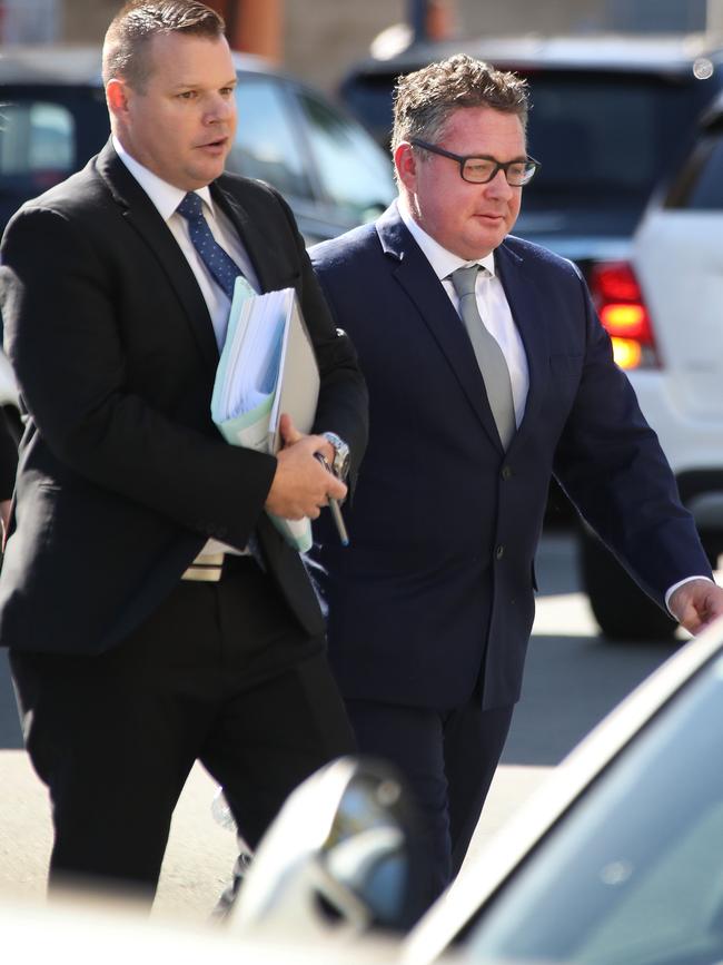 Former SAS soldier Shane Gibbs (right) arrives for sentencing at Southport Court with Dave Garratt of Howden Saggers Lawyers. Picture Glenn Hampson.