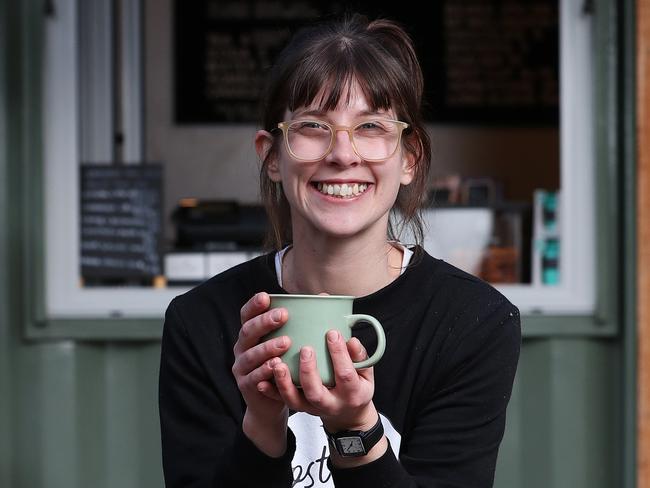 Assistant manager Cassie Lund takes a break with a chai latte at Lost Freight Cafe at The Springs. Picture: NIKKI DAVIS-JONES