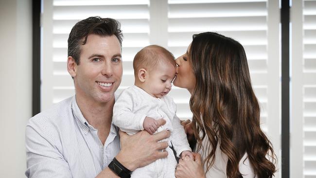 Grant Hackett with partner Sharlene and baby Edward at home. Picture: David Caird