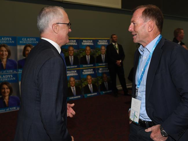 Prime Minister Malcolm Turnbull and former prime minister Tony Abbott speak during the NSW Liberal Party Futures convention. Picture: AAP