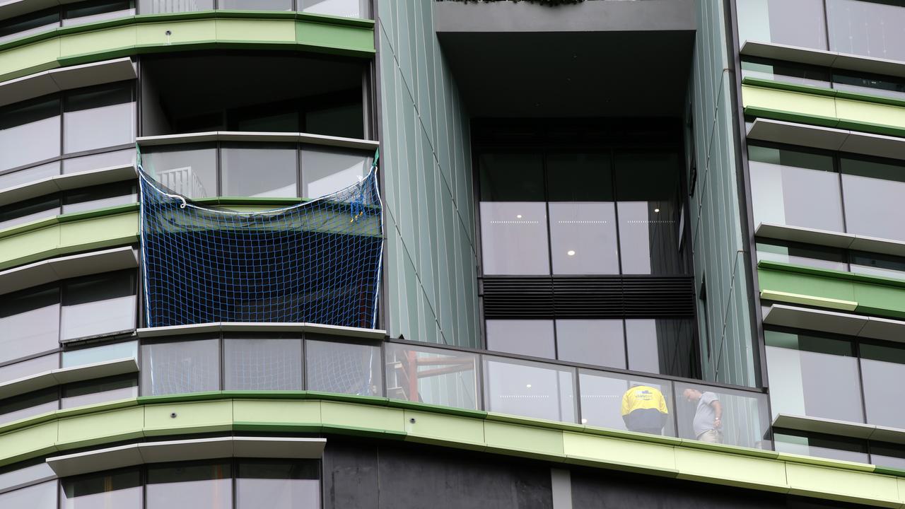 Work been carried out on the tenth floor of the Opal Tower in Sydney Olympic Park. Picture: Jonathan Ng