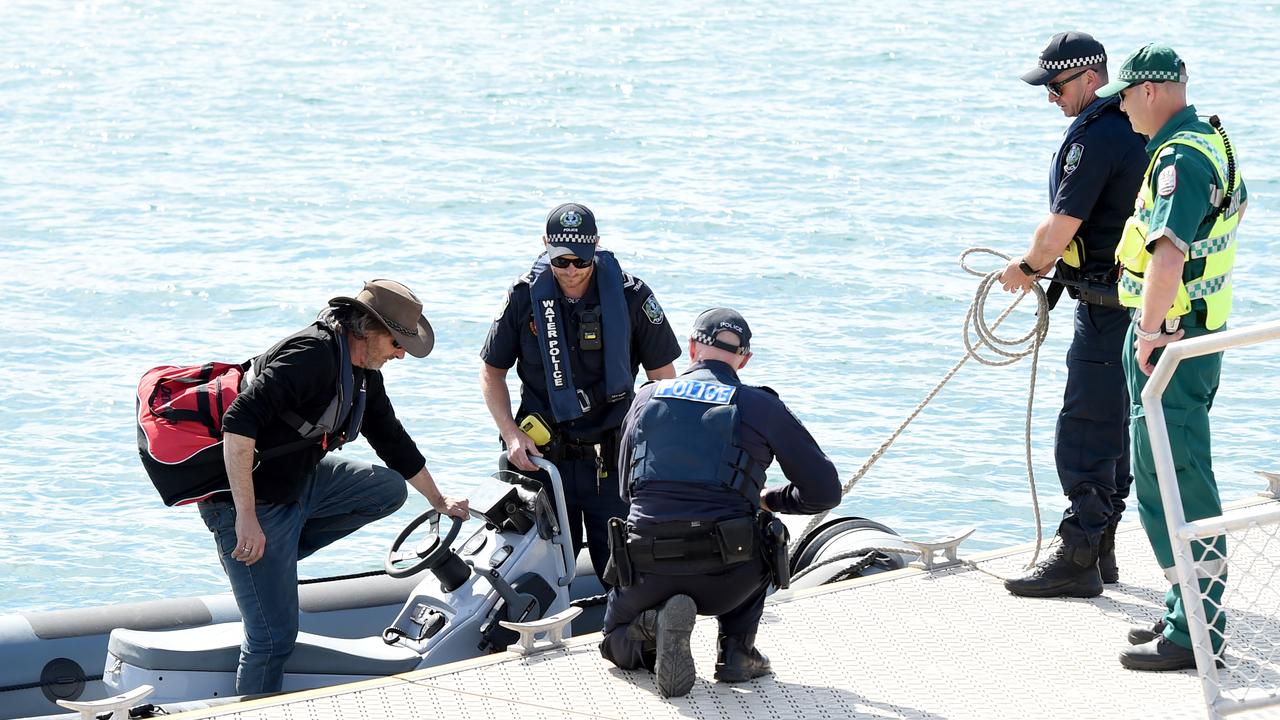 Derek Robinson is brought ashore. Picture: NCA NewsWire / Picture: Naomi Jellicoe