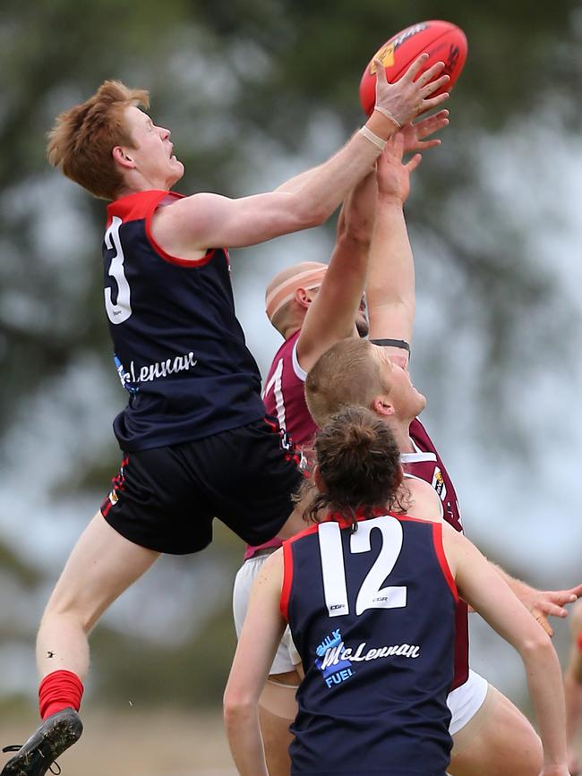 Wycheproof-Narraport’s Gedd Hommelhoff soars over the pack for a mark against Nullawil.