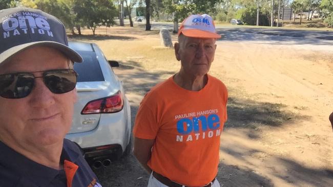 One Nation candidate for Gladstone Kevin Jorgensen (sunglasses) and his volunteer Ian Paterson, who was allegedly involved in an incident with Glenn Butcher’s father, Neville, at the Boyne Island Community Centre pre-polling booth.