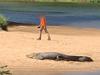 ‘Only a matter of time’: Man on phone only metres from croc