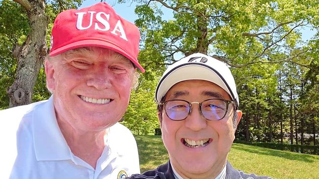 Trump and Japan's former Prime Minister Shinzo Abe pose for a photo while playing a round of golf at Mobara Country Club in Chiba, in May 2019. Picture: AFP