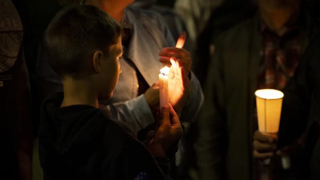 Cassius Turvey, 15, died in a Perth hospital last Sunday after he was allegedly violently assaulted in Middle Swan. The candlelight vigil included people of all ages. Picture: Matt Jelonek / Getty Images