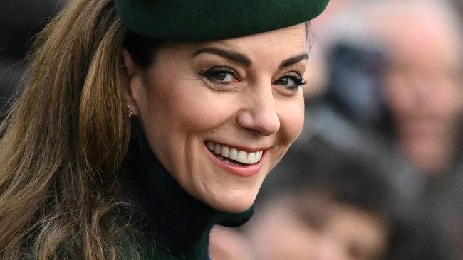 TOPSHOT - Britain's Catherine, Princess of Wales reacts after attending the Royal Family's traditional Christmas Day service at St Mary Magdalene Church in Sandringham, Norfolk, eastern England, on December 25, 2024. (Photo by Oli SCARFF / AFP)