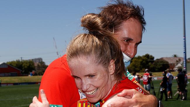 MELBOURNE, AUSTRALIA - JANUARY 16: Cameron Joyce and Tara Bohanna of the Suns celebrate during the 2022 AFLW Round 02 match between the West Coast Eagles and the Gold Coast Suns at VU Whitten Oval on January 16, 2022 in Melbourne, Australia. (Photo by Michael Willson/AFL Photos via Getty Images)