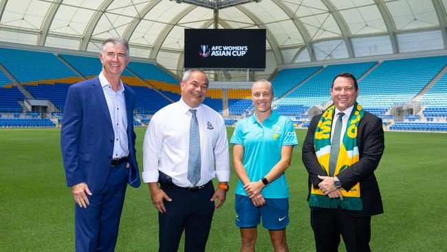 Queensland Minister for Sport and Racing Tim Mander, City of Gold Coast Mayor Tom Tate, Matildas player Tameka Yallop, Football Australia CEO James Johnson at the 2026 Women's Asian Cup dates, venues announcements. Picture: Chris Hyde/Getty Images.