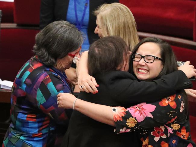 Jaala Pulford is congratulated by fellow MPs Harriet Shing and Fiona Patten. Picture: Scott Barbour/Getty Images