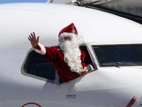 Qantas Captain Steve Anderson from Hope Island as santa.