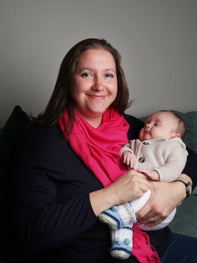 Mollie D’Arcy with baby Till Barnett, who she birthed as a surrogate for same-sex couple Daniel Gray-Barnett and Daniel Barnett. Picture: Nikki Davis-Jones