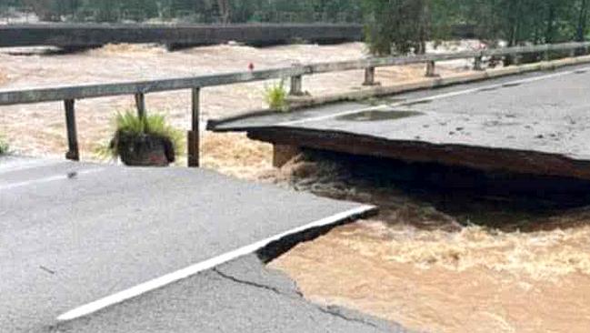 Bevan Gosling was shocked to find Ollera Creek Bridge cut in half from flood water on the Bruce Highway north of Townsville.